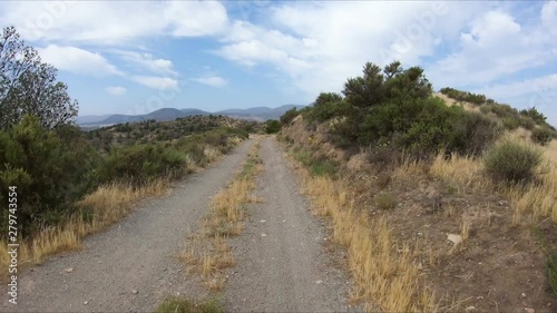 a mountain path on a summer day next to Alhabia village, province of Almeria, Andalusia, Spain photo