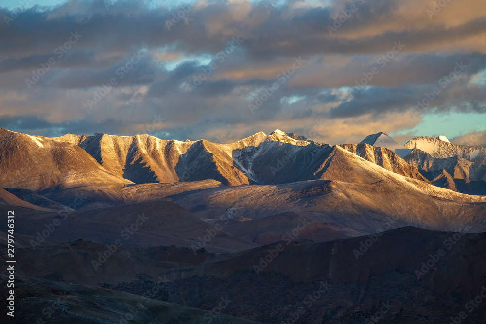 Himalayan mountain landscape along Leh to Manali highway during sunrise. Rocky mountains in Indian Himalayas, India
