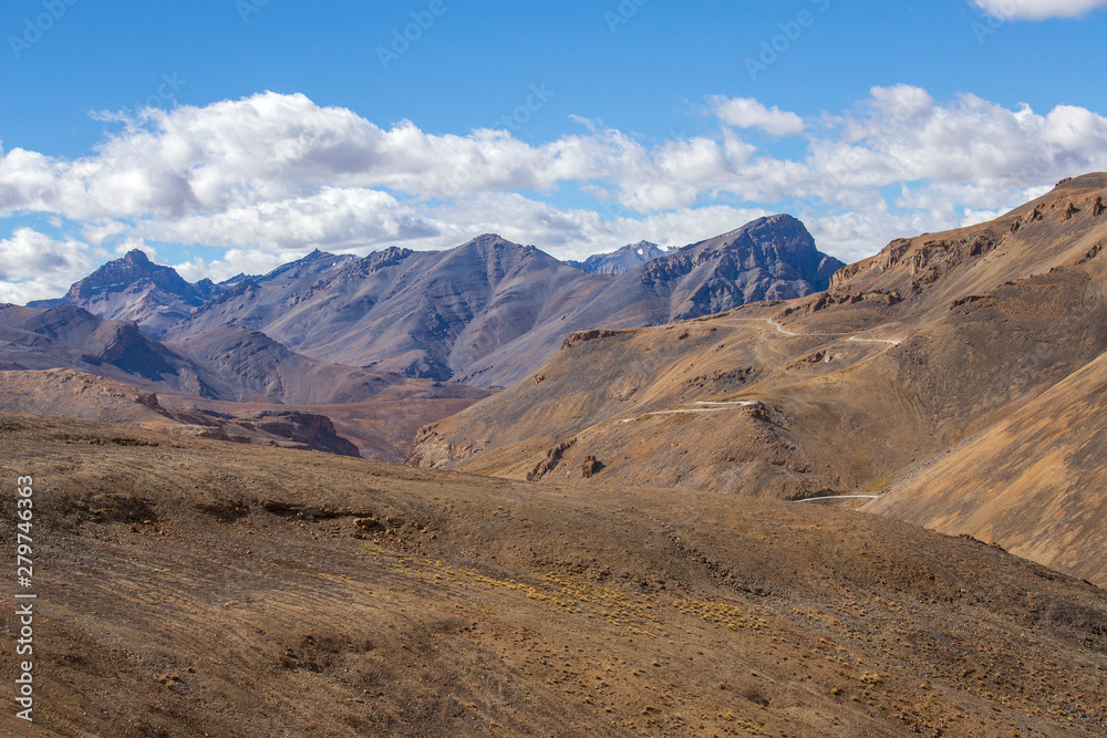 Himalayan mountain landscape along Leh to Manali highway. Winding road and rocky mountains in Indian Himalayas, India