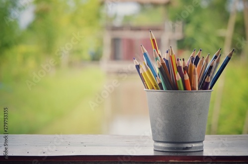 color pencils in a cup