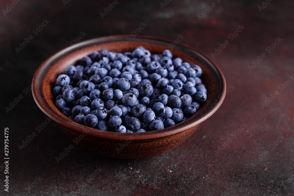 Blueberry antioxidant organic superfood in a bowl concept for healthy eating and nutrition Blueberry antioxidant organic superfood in a bowl concept for healthy eating and nutrition