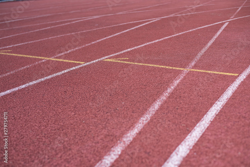 Sport. A red treadmill or athletics track at the stadium. Copy space