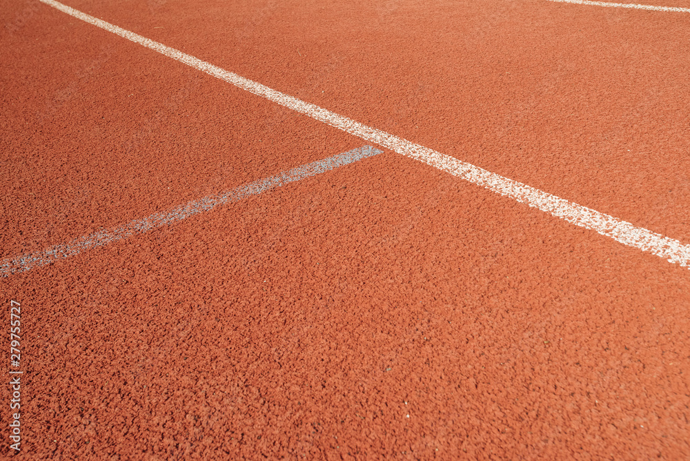Sport. A red treadmill or athletics track at the stadium. Copy space Sport. A red treadmill or athletics track at the stadium. Copy space