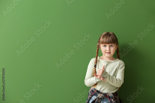 Cute deaf mute girl using s...