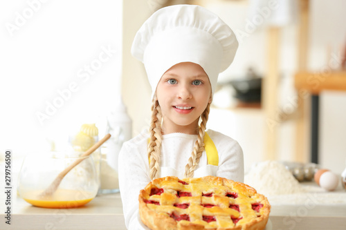 Cute little chef with pie i...