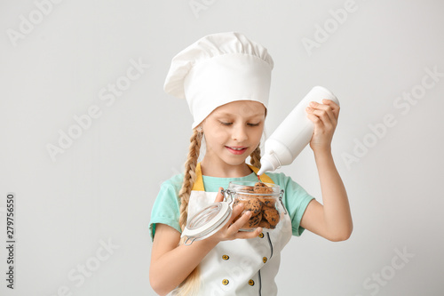 Cute little confectioner on...