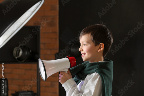 Little film director with m...