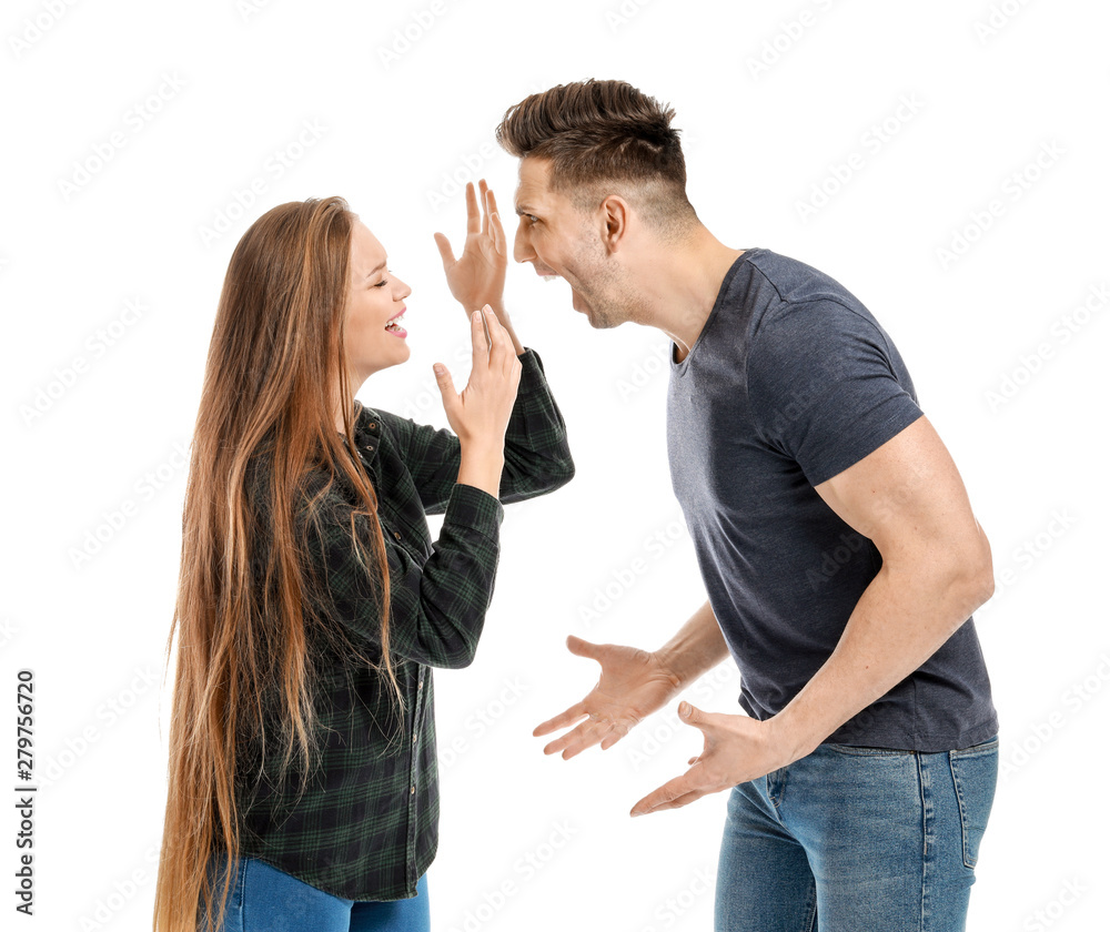 Young quarrelling couple on white background Young quarrelling couple on white background