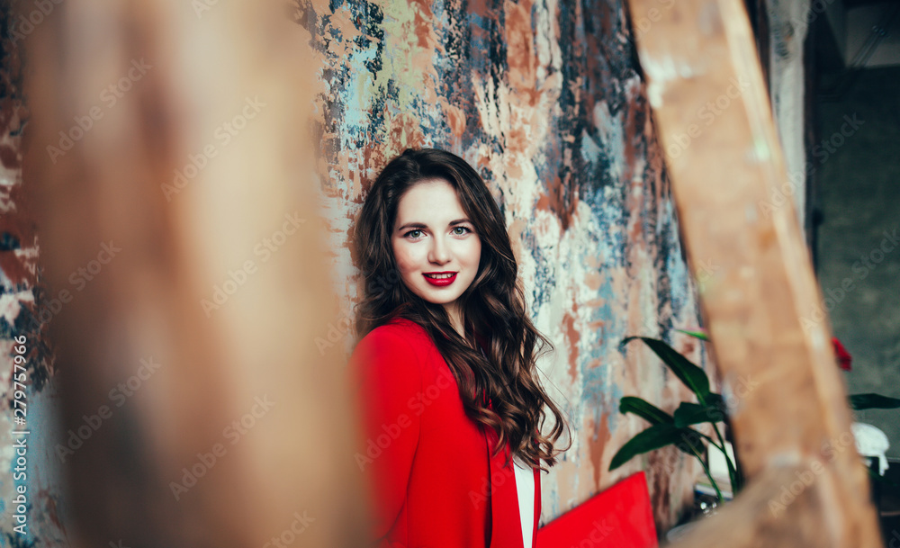 beautiful young woman with red lips in business style