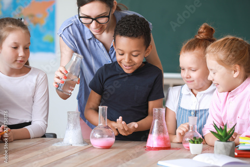 Teacher conducting chemistr...