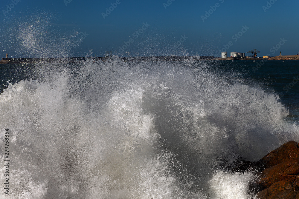 Splashing Atlantic ocean wave at Portugal coast.