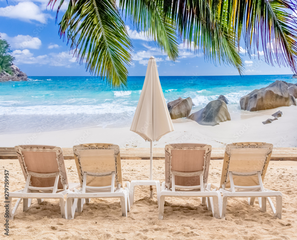 chairs and umbrella on the beach, Seychelles Islands