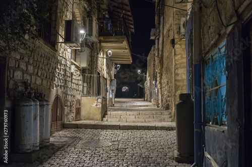 Night view of a quiet street in the old city of Safed in northern Israel