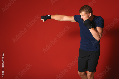 Strong male boxer on color ...