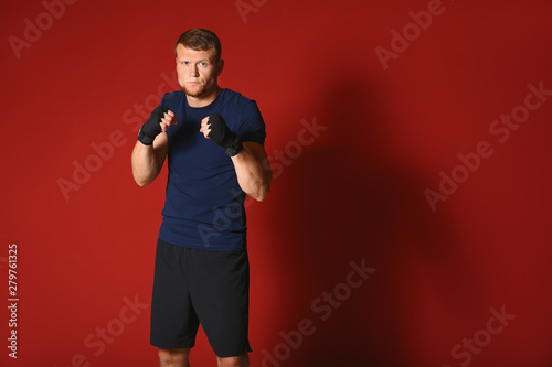 Strong male boxer on color ...