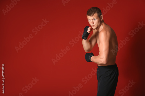 Strong male boxer on color ...