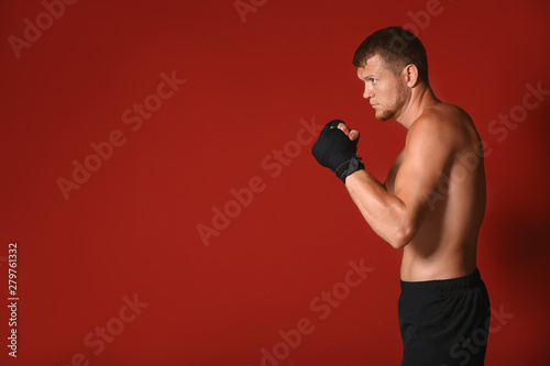 Strong male boxer on color ...