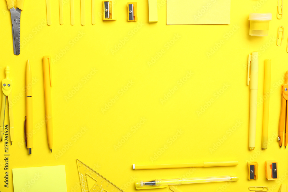 Frame made of school supplies on color background Frame made of school supplies on color background
