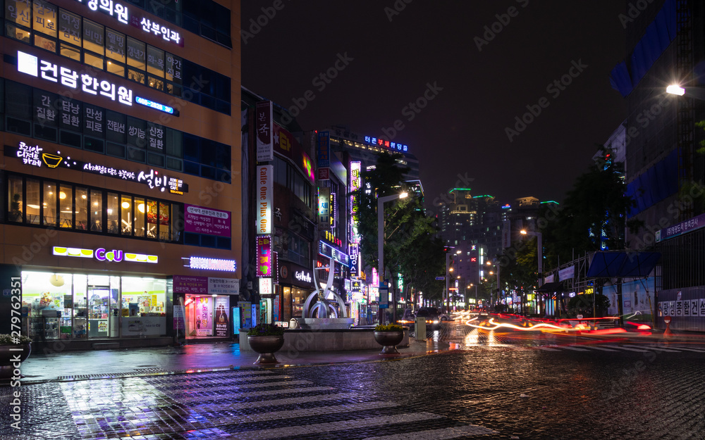 Street Scenario with Buildings, Central Square and traffic lights during Night of Busanjin District, Busan, South Korea. Asia.
