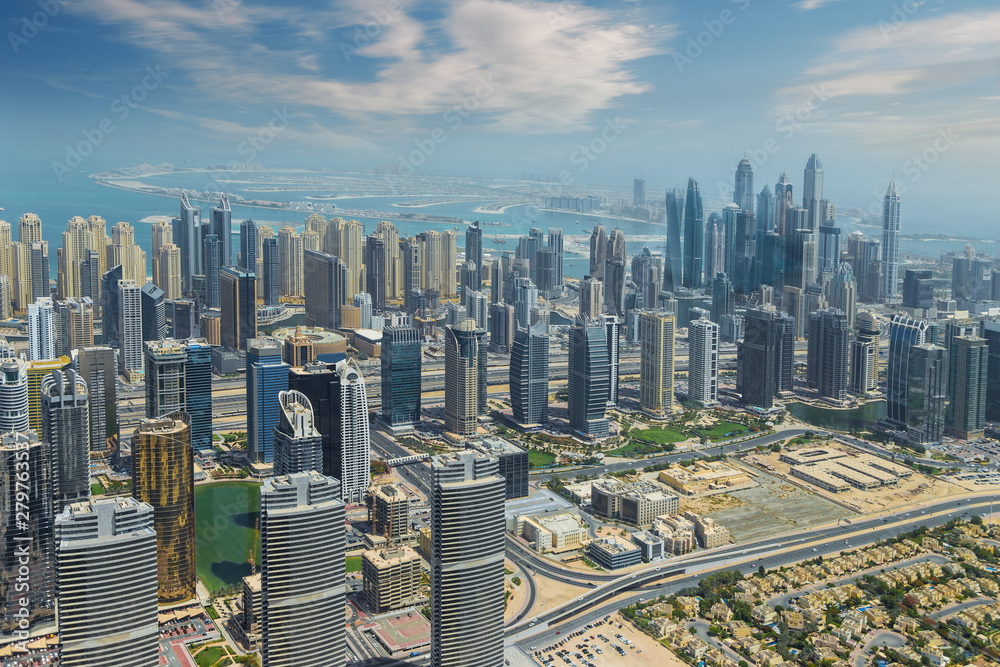 Aerial view of modern city skyscrapers in Dubai, United Arab Emirates.