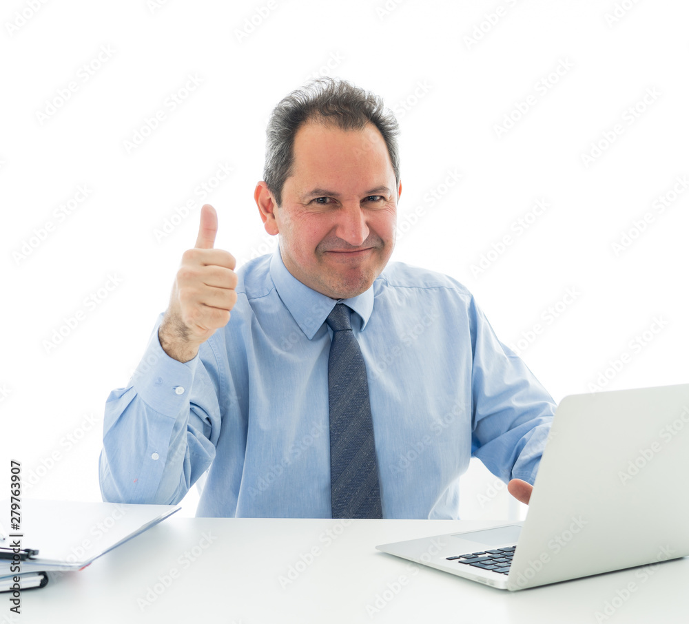 Mature caucasian businessman working on laptop computer at office in happy working and satisfaction Mature caucasian businessman working on laptop computer at office in happy working and satisfaction
