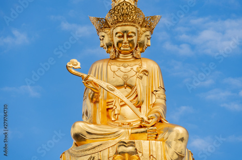 Ten-way Puxian gold statue at the top of Emei Mountain in Sichuan Province, China © Weiming