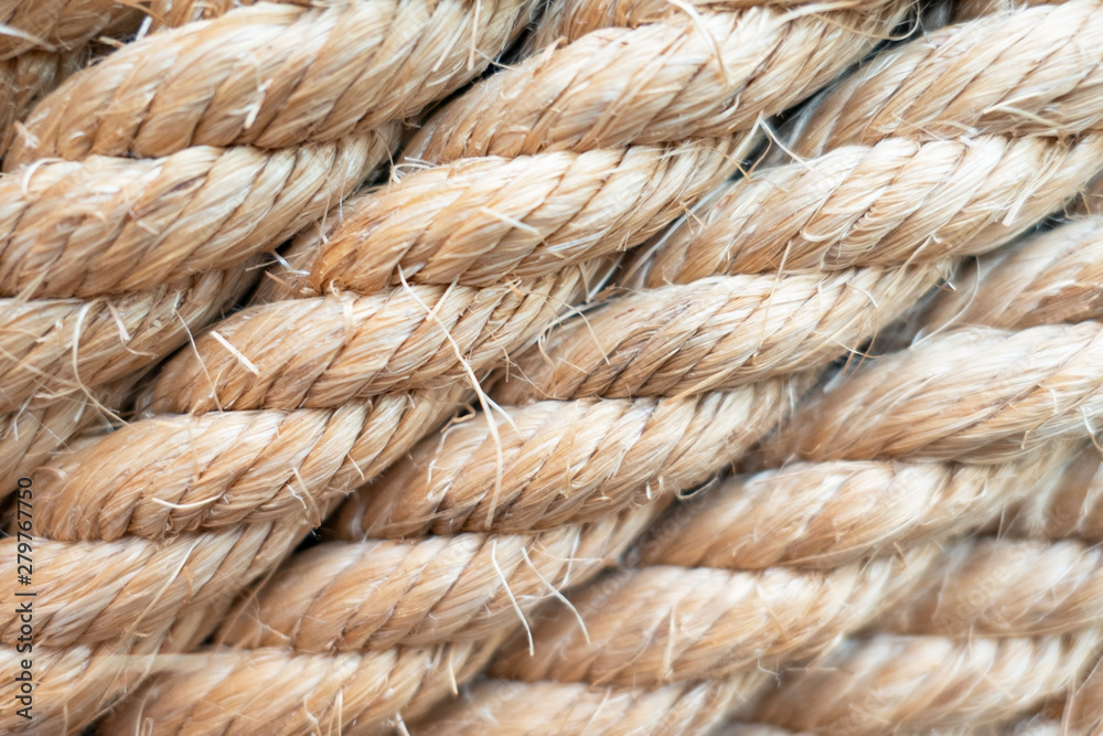 closeup brown strong nautical rope for background .