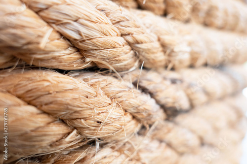 closeup brown strong nautical rope for background .