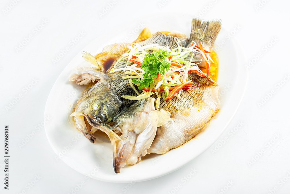 Chinese Cantonese cuisine dish with steamed squid on white background