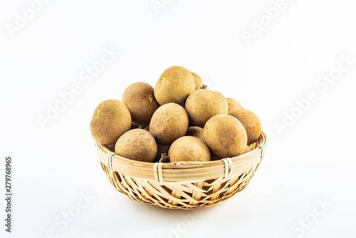 Fresh fruit longan on a plate on white background