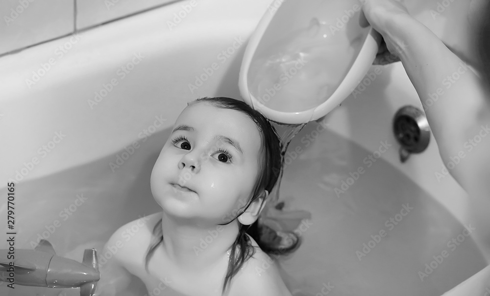 Young children take a bath. Children wash in the bathroom. Brother and