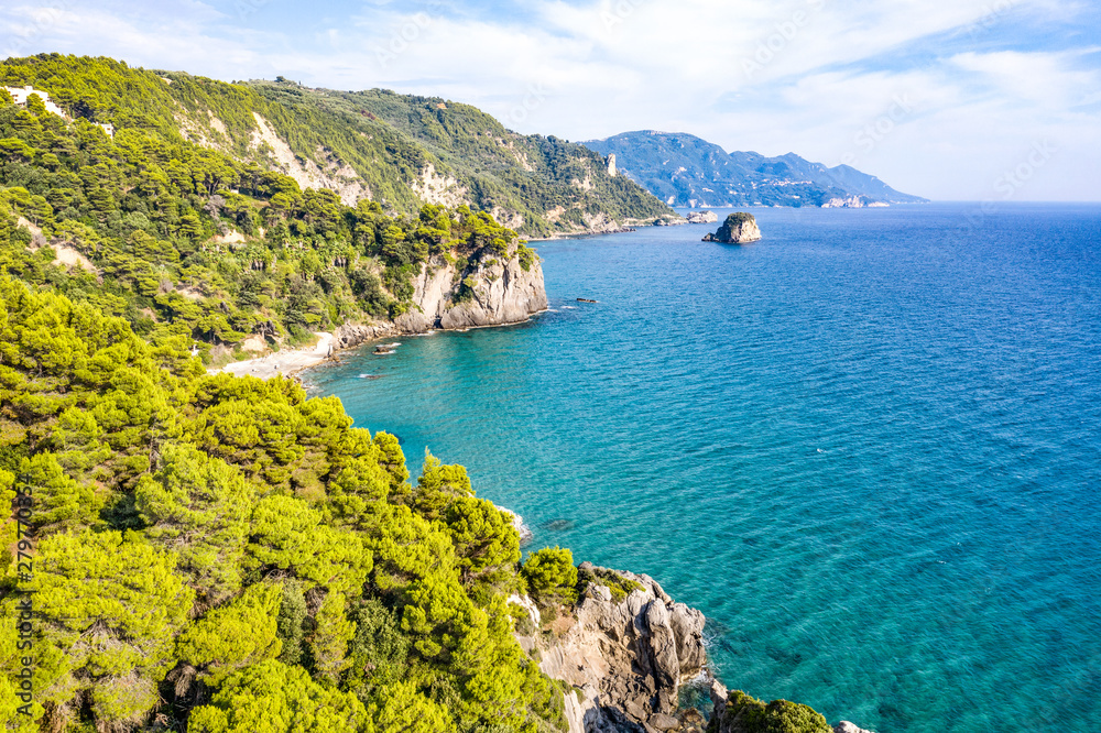 Aerial view of beautiful seashore in summer. Rocky beach and green islands seen from above. Aerial view of beautiful seashore in summer. Rocky beach and green islands seen from above.