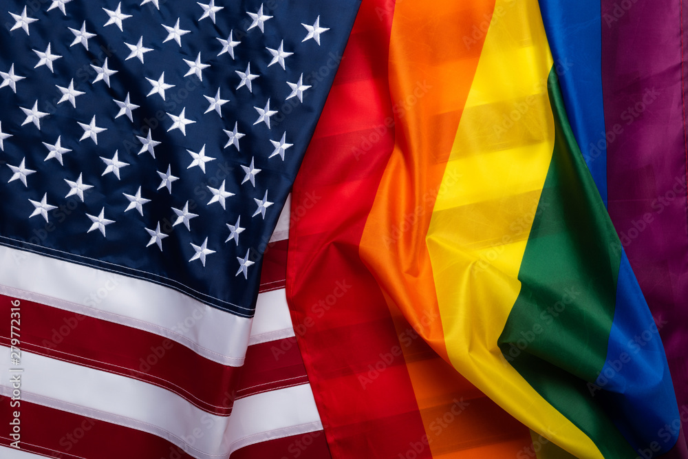 Pride rainbow lgbt gay flag and US american flag . Equality diversity freedom in USA concept. - obrazy, fototapety, plakaty 
