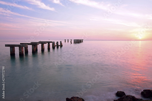 Boca Grande Florida sunset at old pier abutments in water