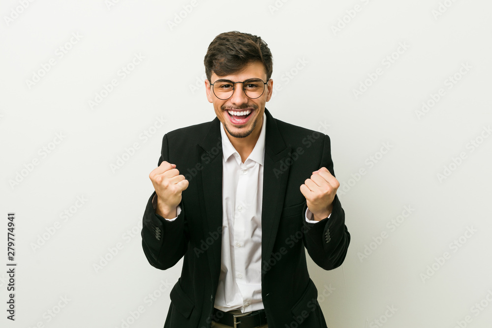 Young business hispanic man cheering carefree and excited. Victory concept. Young business hispanic man cheering carefree and excited. Victory concept.