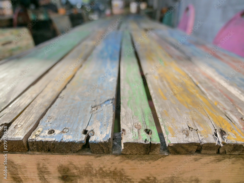 Multicolored old wooden table for any background