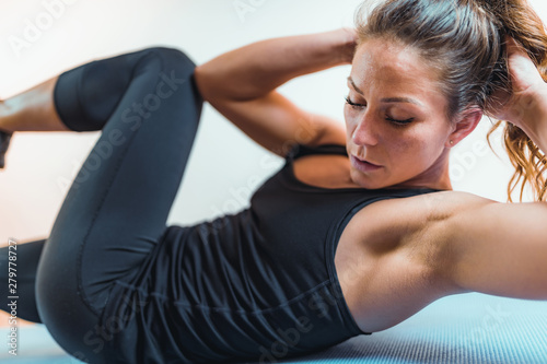 Woman Doing High-Intensity Interval Training Exercises photo