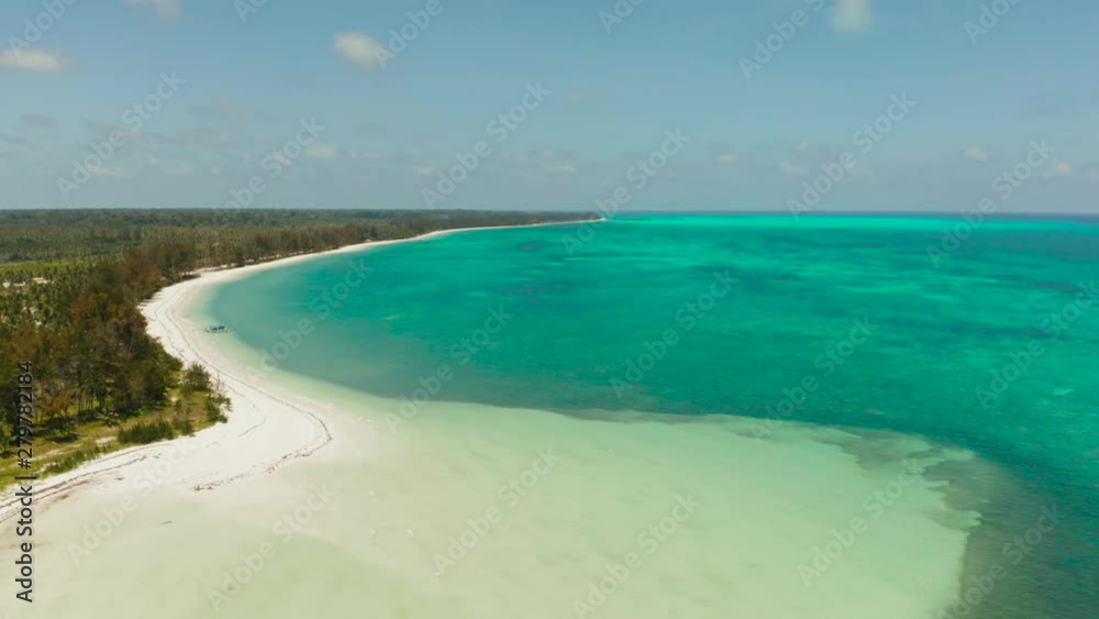 Coast of a tropical island with a sandy beach and turquoise water, top view. Punta Sebaring, Balabac, Palawan. Summer and travel vacation concept. Coast of a tropical island with a sandy beach and turquoise water, top view. Punta Sebaring, Balabac, Palawan. Summer and travel vacation concept.