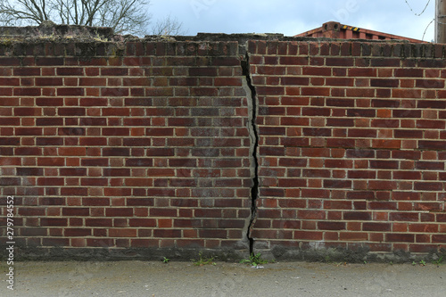 Wall bricks with a crack, background images.