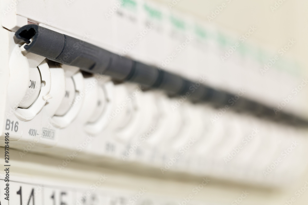 Electric circuit breaker fuse box in private home close up