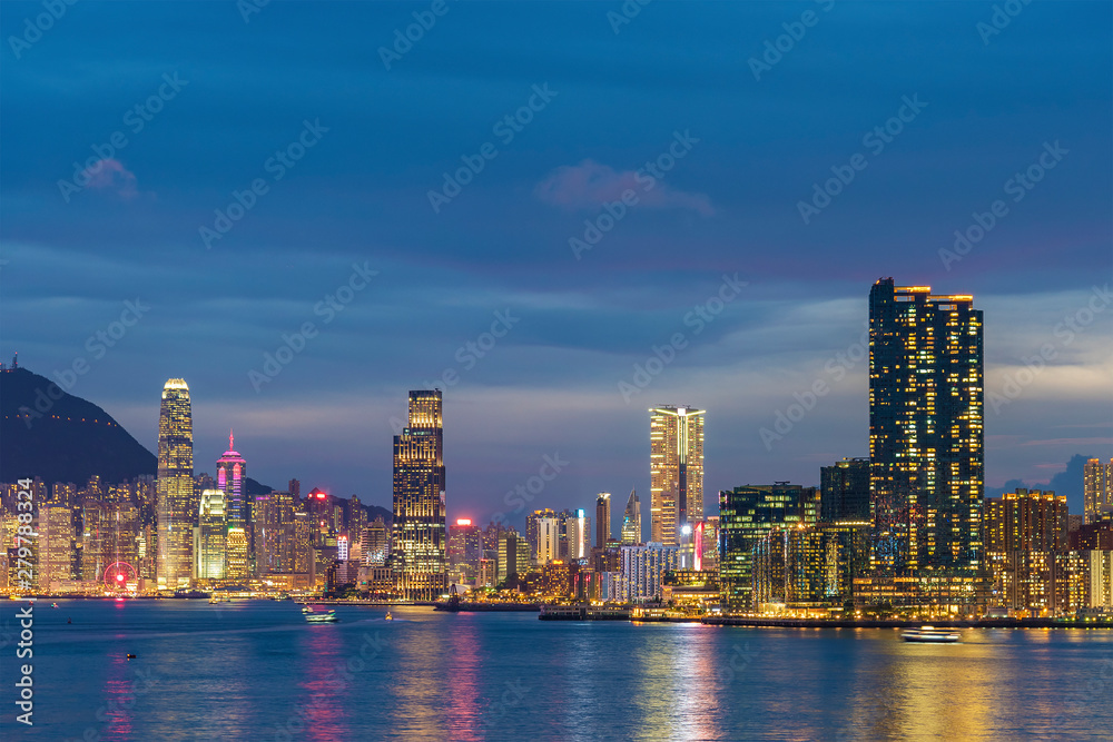 Panorama of Skyline of Victoria Harbor of Hong Kong city at dusk