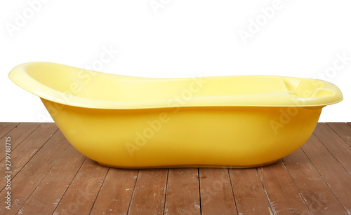 Motherhood  and hygiene - Yellow children bath photo