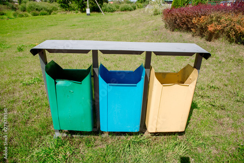 Trash Containers for Garbage Separation -- three colors for plastic, metal and burnables
