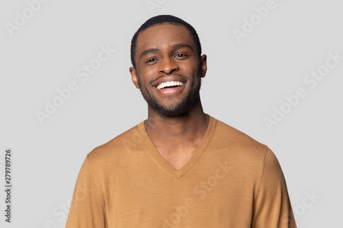 Headshot portrait of black man posing in studio