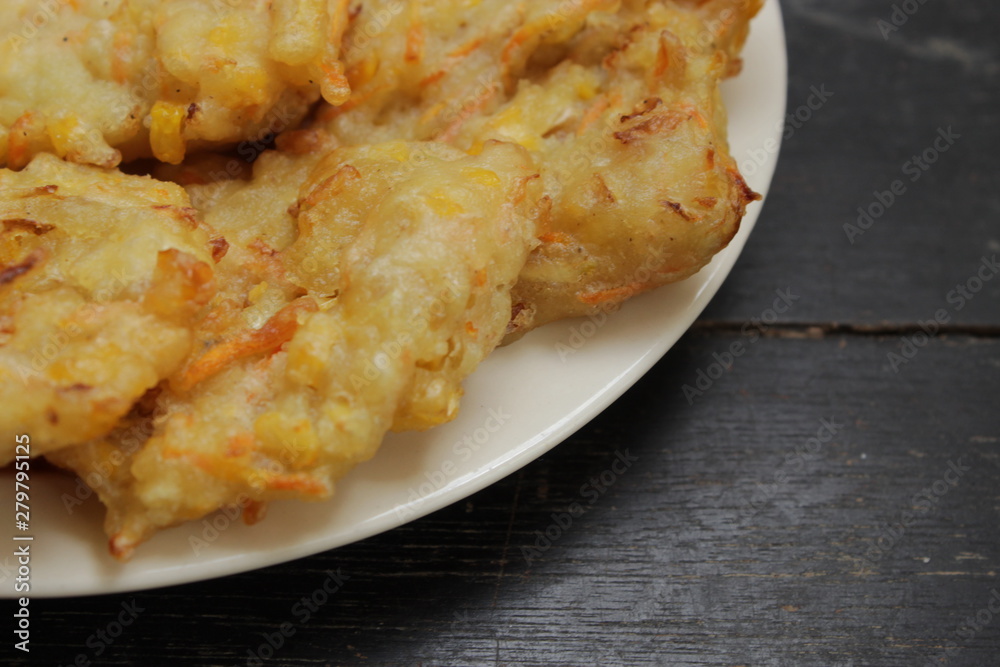Bakwan is an Indonesian fried meal consisting of vegetables and batter Bakwan is an Indonesian fried meal consisting of vegetables and batter