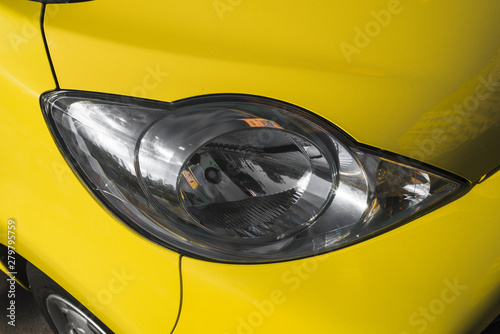 Modern led headlight ofÂ yellow car