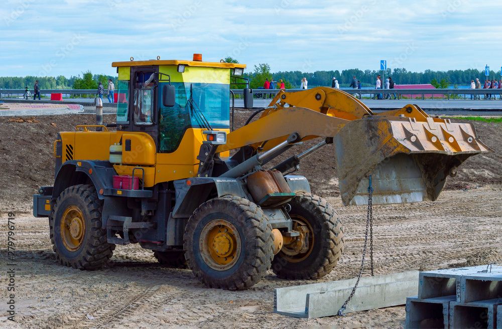 yellow bulldozer at construction site