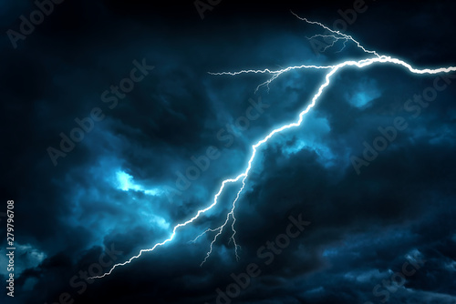 Lightning strike on a dark stormy sky.