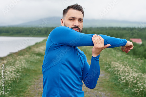 Man exercising outdoor on gloomy day