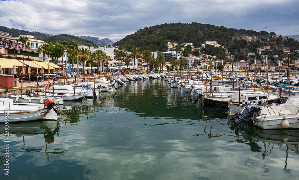 The seafront and harbour at Port de Soller with yachts and boats, Spain